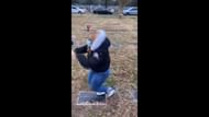 Adult female dancing on top of a tombstone (Image Via YouTube/Pegasus)